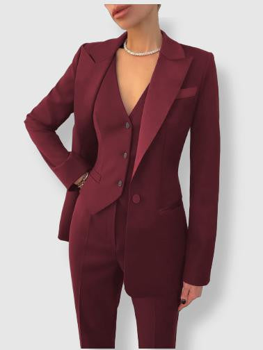 Elegant women's tailored power suit. Close-up of notch lapel blazer for sophisticated office fashion.