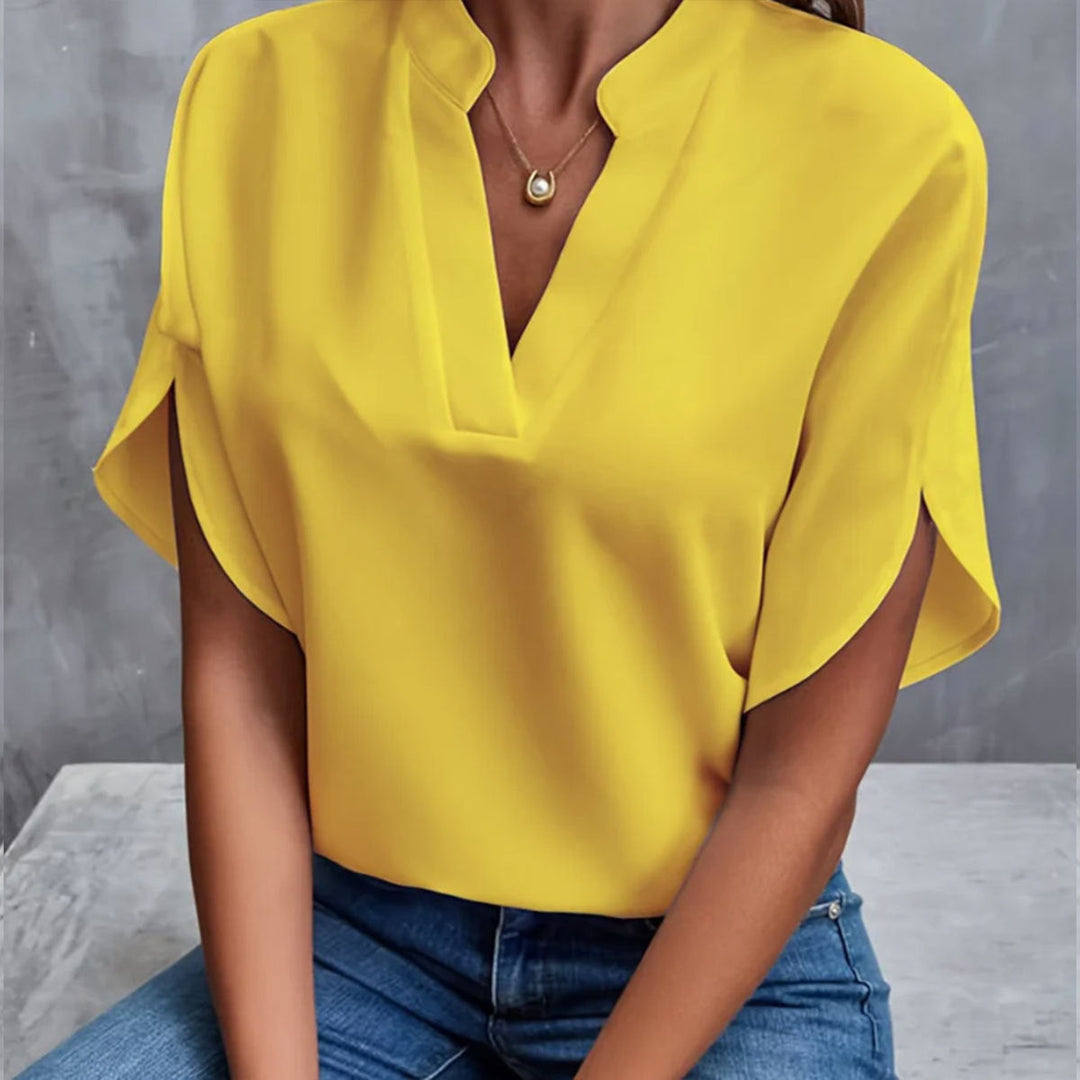 Soft, flowy women's short sleeve t-shirt. Comfortable & vibrant summer blouse for casual wear.