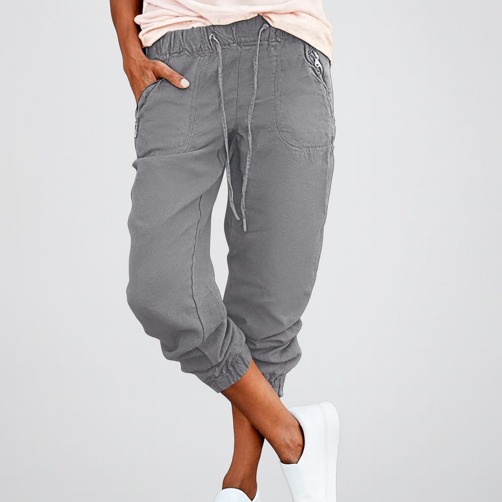 Stylish women's utility cargo pants with multiple pockets, ideal for spring & autumn fashion. Comfortable relaxed fit.