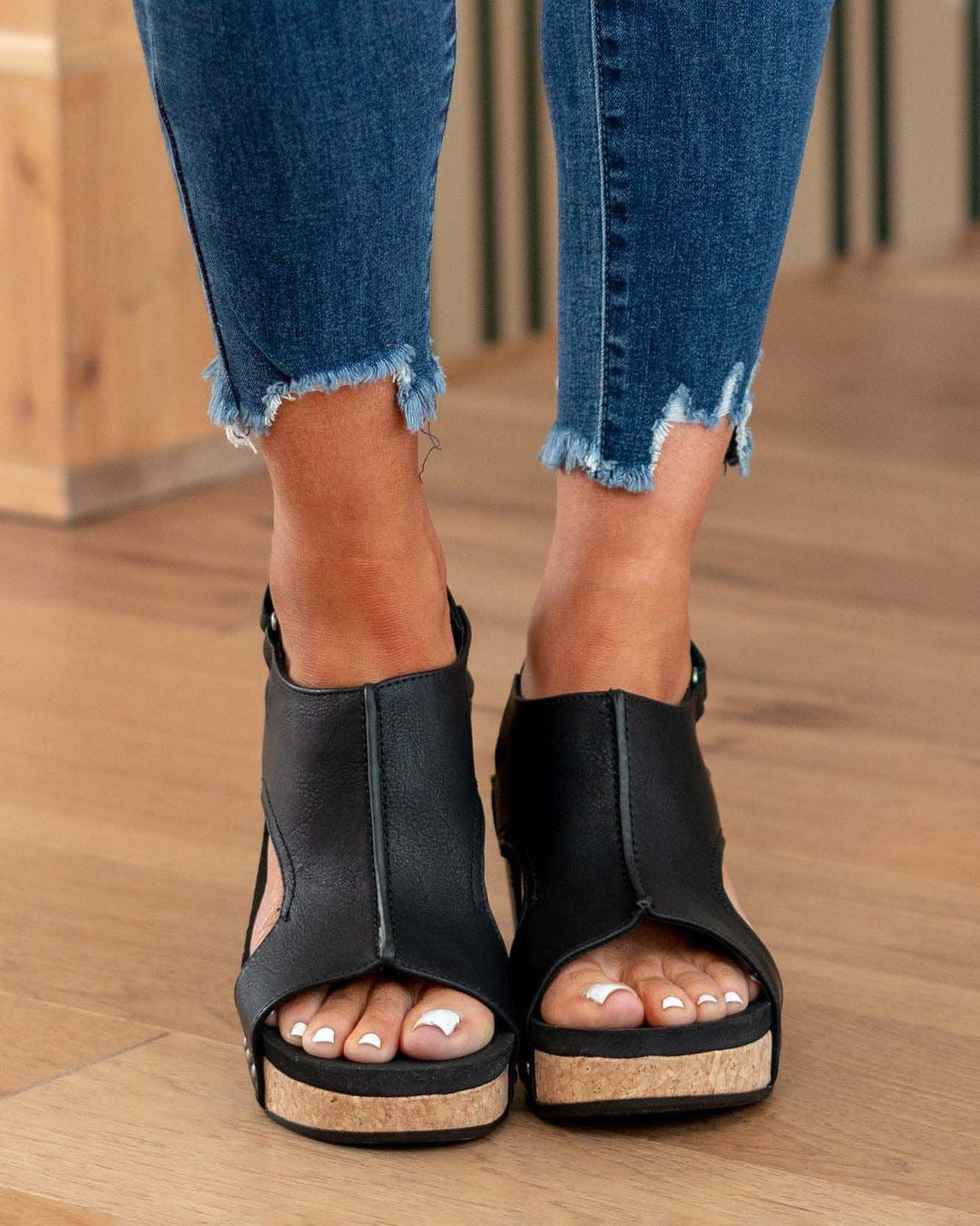 Smart casual women's footwear: comfortable vegan wedge sandals with ergonomic footbed and cork heel.