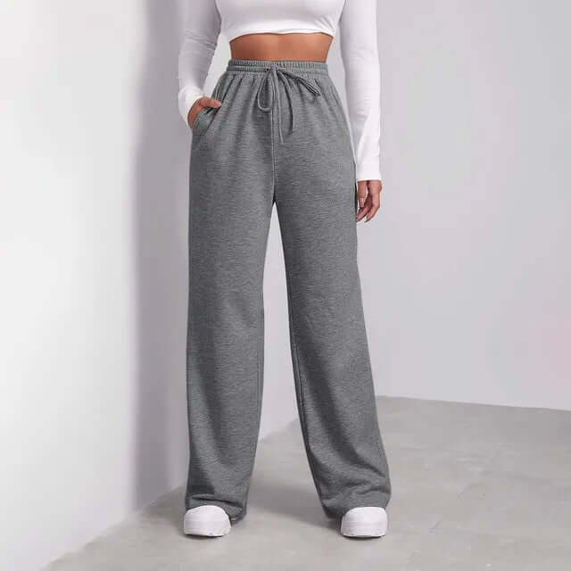 Stylish women's wide-leg viscose blend trousers with an adjustable drawstring waist for a relaxed, comfortable fit.