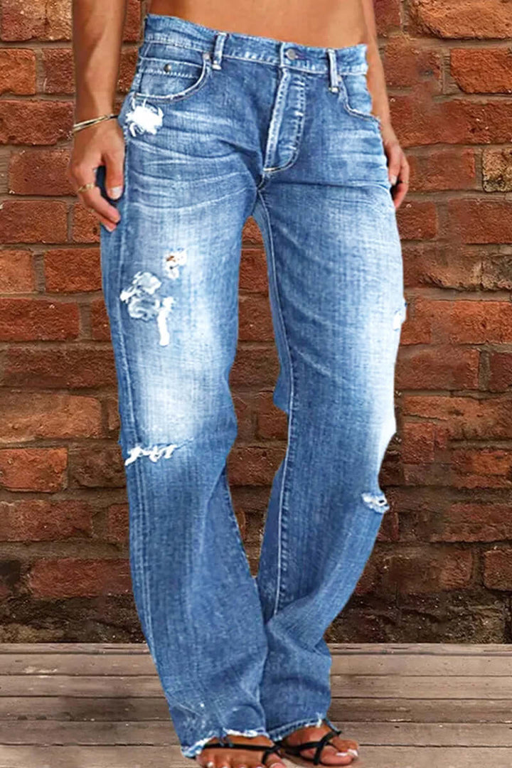 Stylish women's straight leg blue jeans, made from comfortable denim for a flattering and relaxed fit.