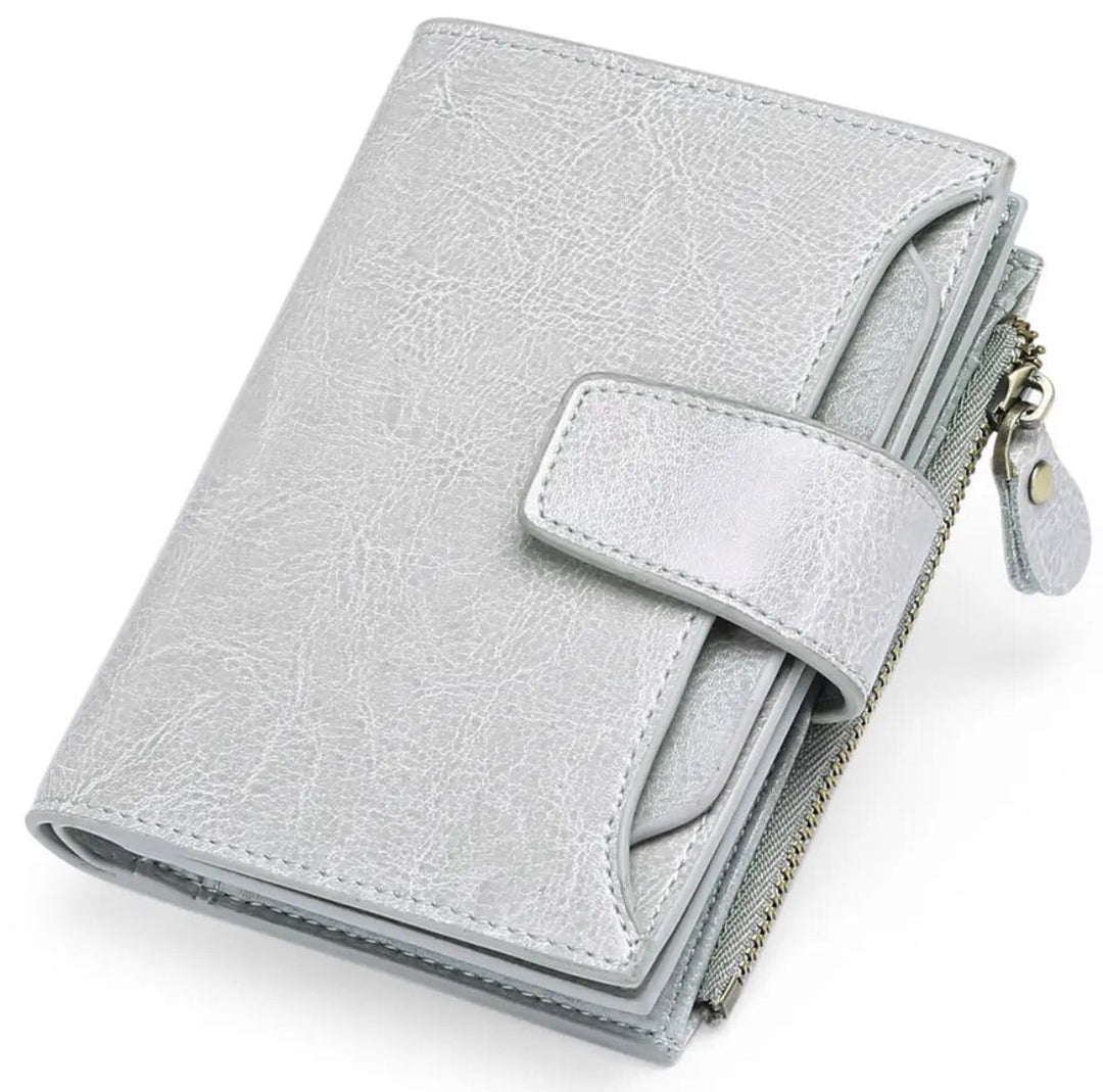 Women's genuine leather RFID wallet, compact and secure with space for cards and coins.
