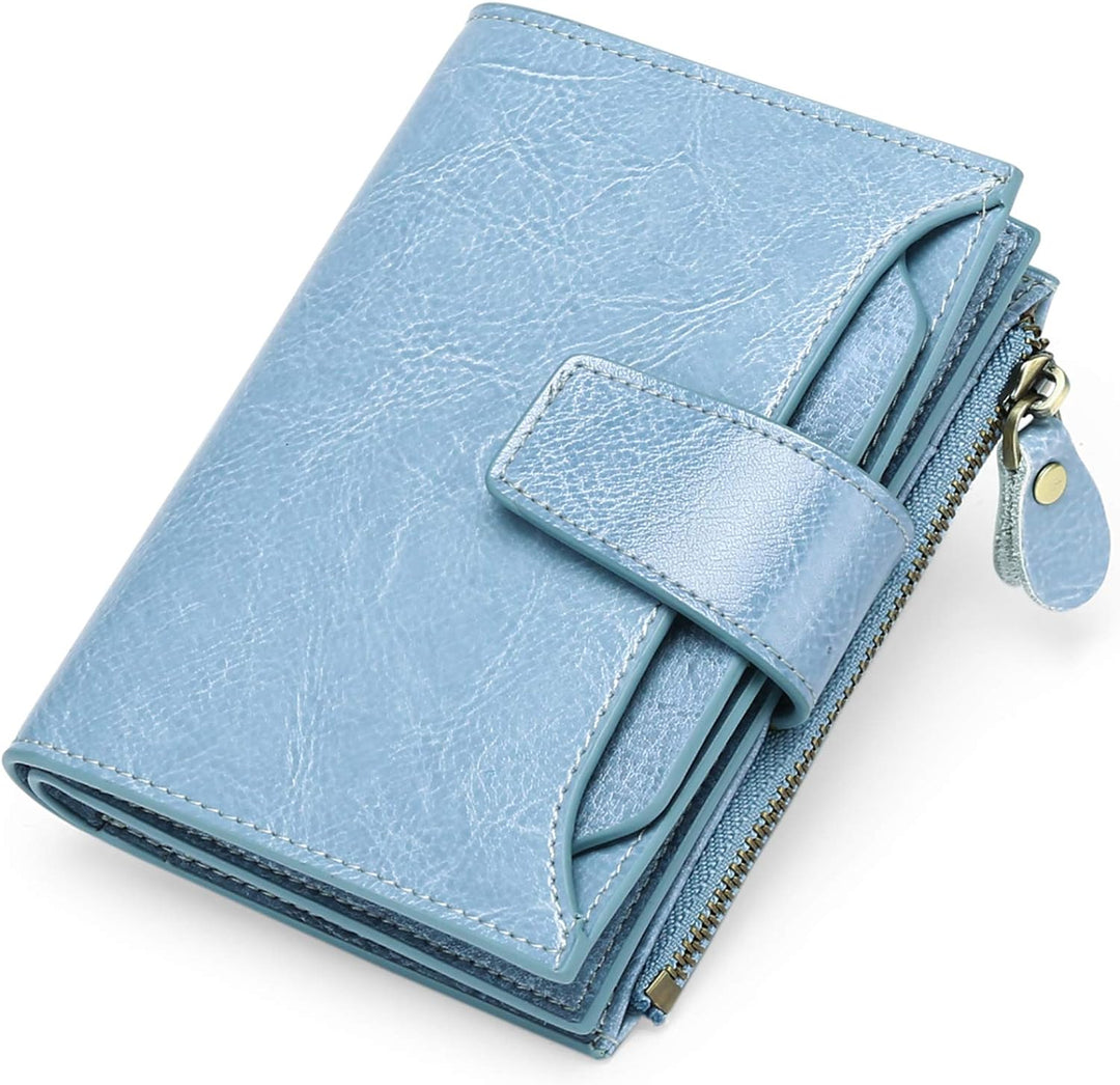 Women's compact leather RFID blocking wallet with card slots and coin purse. Secure & stylish everyday accessory.