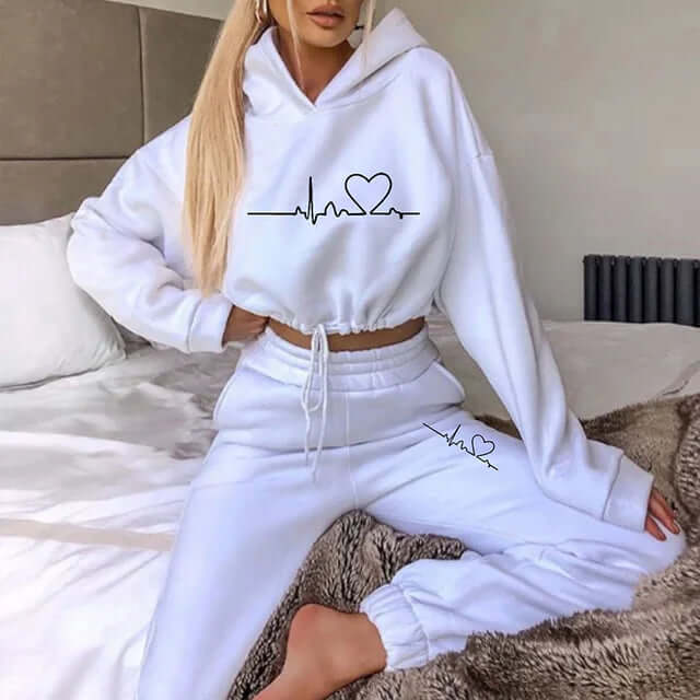 Fashionable women's fitness apparel set: a cozy hoodie and durable leggings for ultimate comfort and style.