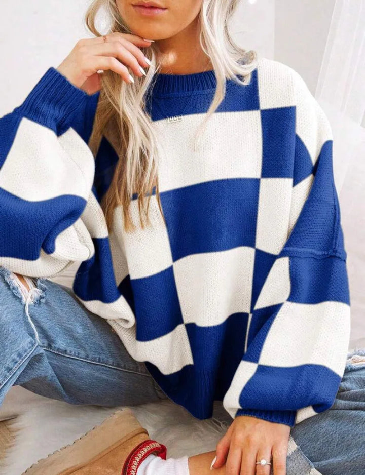 Women's casual checkerboard sweater. Cozy, trendy, and perfect for relaxed winter style.