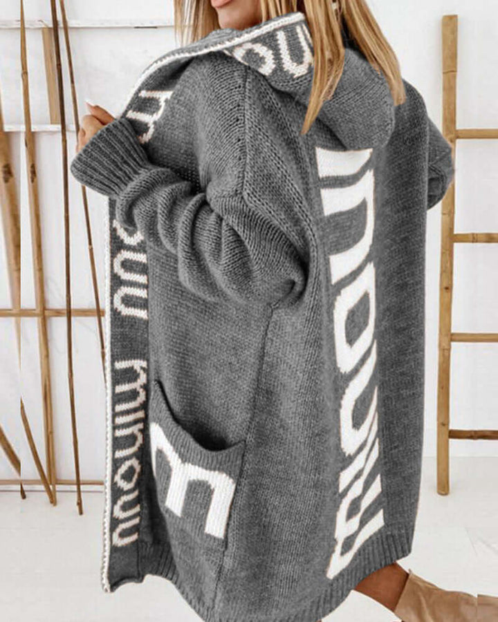 Versatile women's hooded cardigan, a stylish loose-fit sweater for various casual outfits.