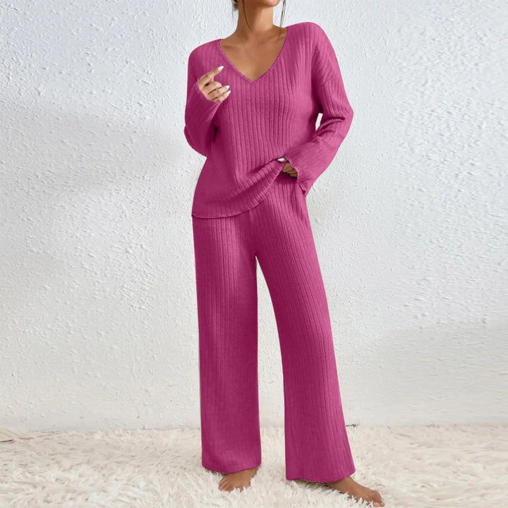 Woman relaxing in a comfortable women's 2-piece knitted lounge set. Ideal cozy loungewear.