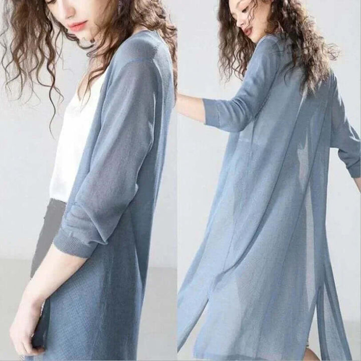 Elegant women's cozy long cardigan, a versatile knitwear piece for stylish seasonal wear.
