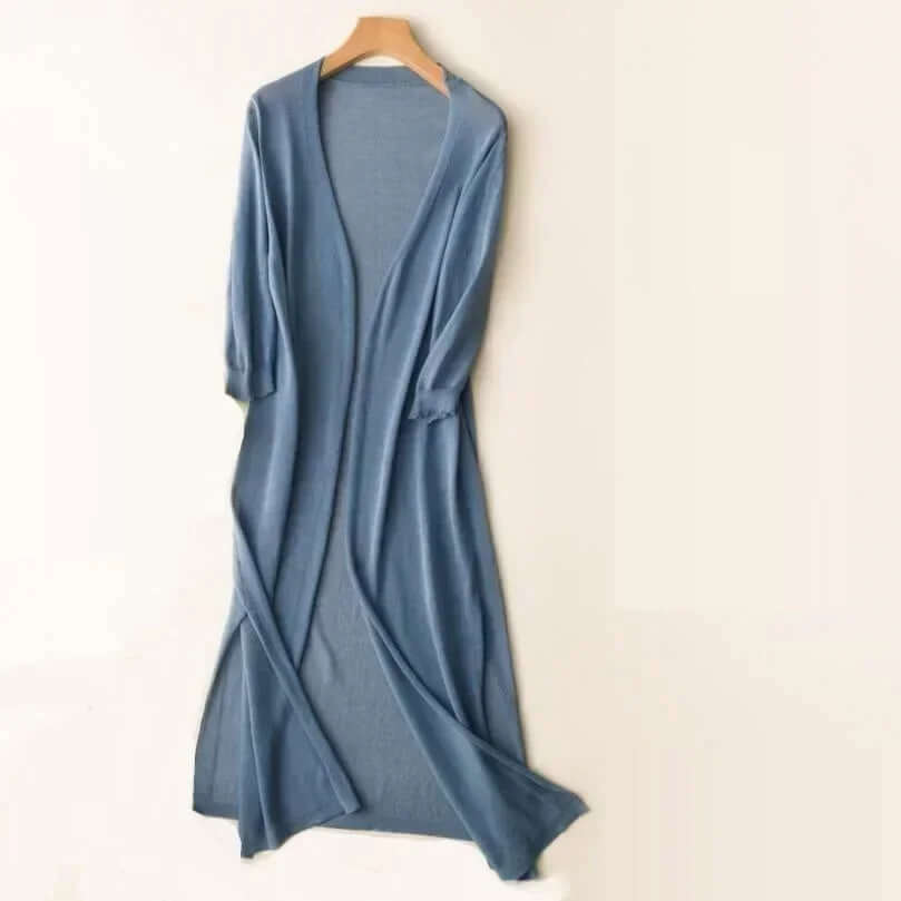 Cozy women's long cardigan, an elegant knitwear piece for stylish and comfortable wear.