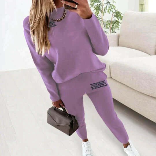 Soft women's two-piece loungewear set with letter print. Cozy comfort wear, ideal for relaxed home attire or casual outings.