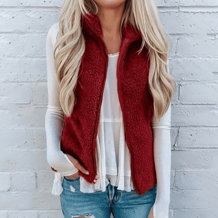 Chic women's open-front knitted cardigan with roomy pockets, great for adding a cozy, lightweight layer to outfits.