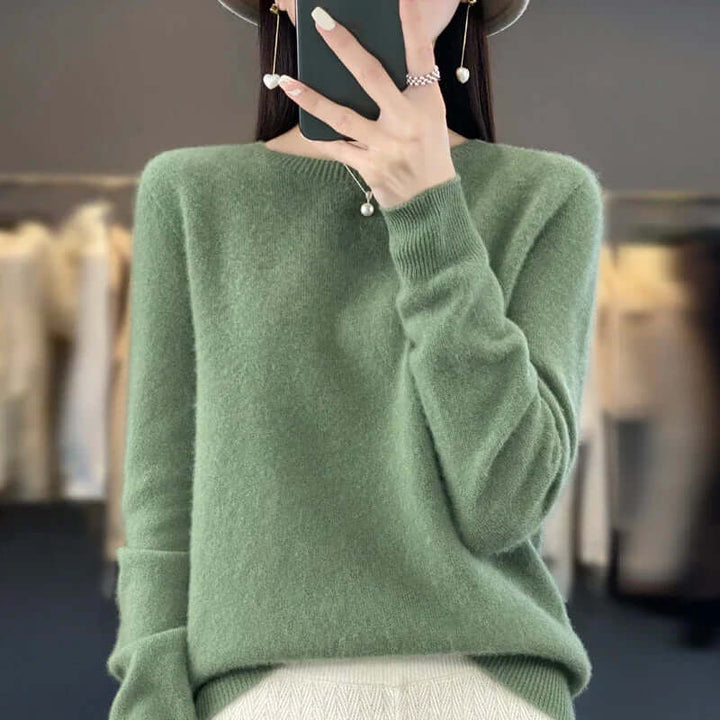 Women's cozy O-neck Merino wool jumper, perfect for winter fashion and warmth.