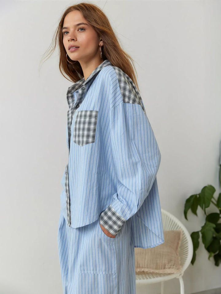 Soft cotton flannel pajama top for women, featuring a classic plaid pattern and relaxed fit.