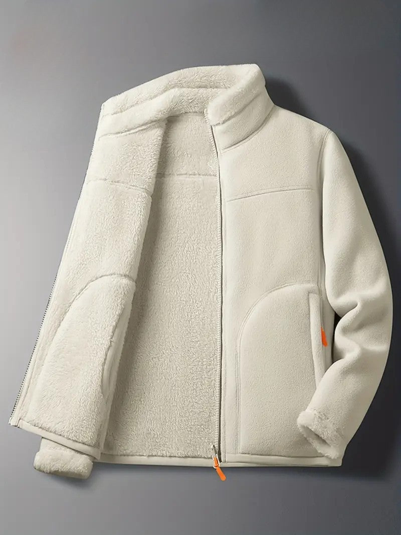 Women's reversible winter jacket, partially open, showing cozy interior & stylish stand collar design.