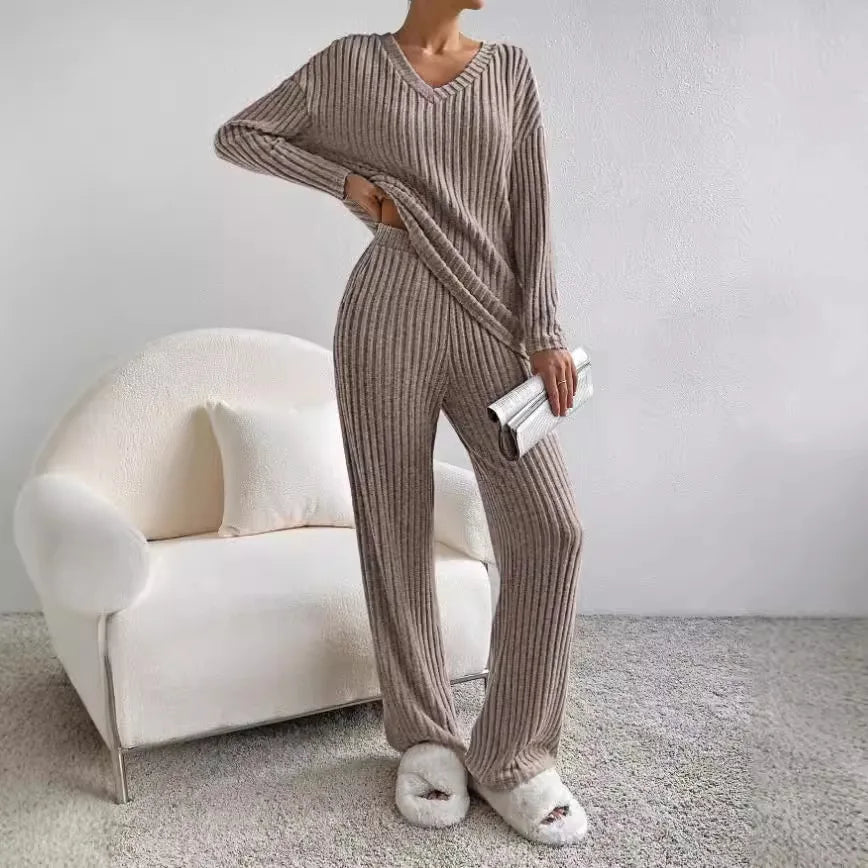 Elegant women's ribbed knit loungewear set, versatile for relaxing at home or quick errands.