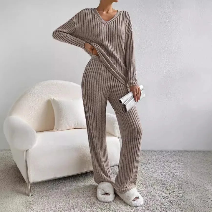 Elegant women's ribbed knit loungewear set, versatile for relaxing at home or quick errands.