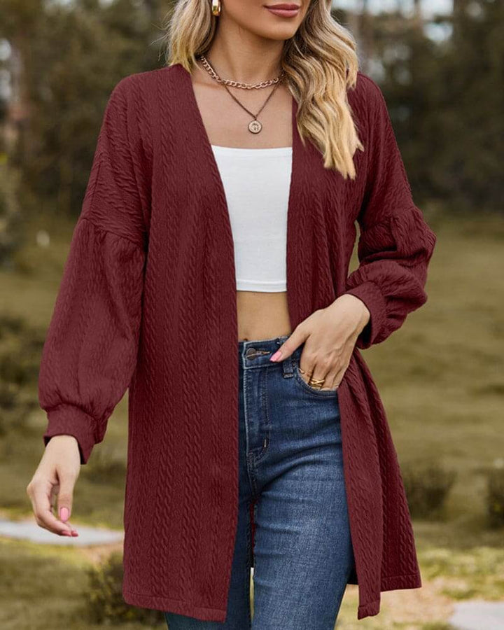 Warm & stylish women's textured cardigan, featuring elegant lantern sleeves for a sophisticated fall fashion look.