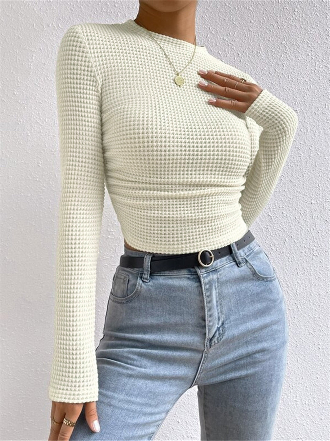 Layer up with this women's cozy waffle knit long sleeve top. Stylish & comfortable for any casual outing.