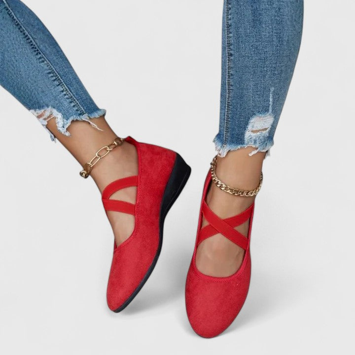 Elegant women's cross-strap ballet flats. Fashionable and comfortable slip-on shoes perfect for versatile styling.