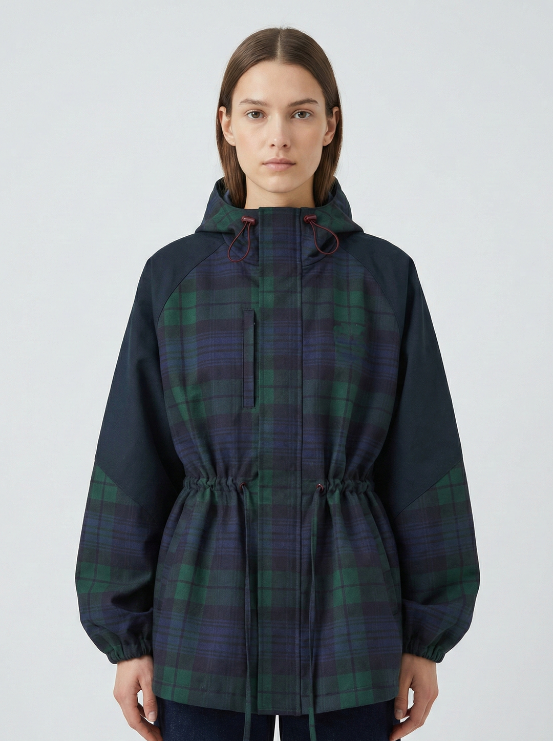 Women's dark blue oversized plaid hooded jacket. Features adjustable waist, perfect for casual outerwear & streetwear.
