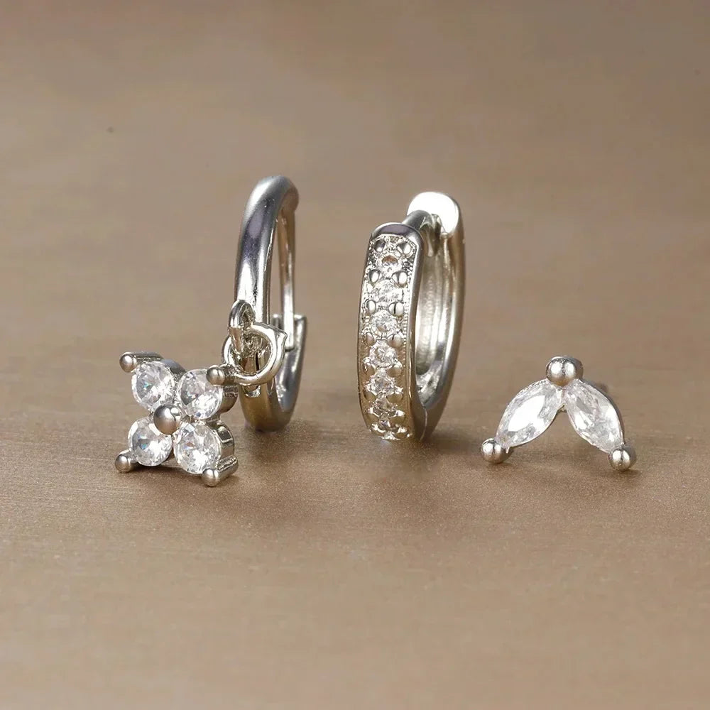 Stylish women's ear piercing set of hypoallergenic surgical steel earrings, studs, hoops & cubic zirconia.