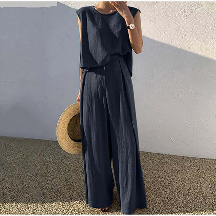 Casual women's sleeveless top & wide-leg trousers outfit, a stylish two-piece set for warm weather.