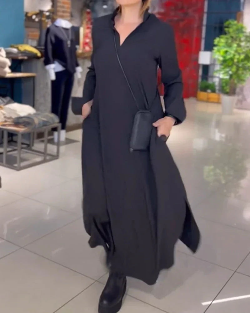 Women's elegant black long sleeve maxi dress for formal evening events. Perfect for sophisticated and modest fashion.
