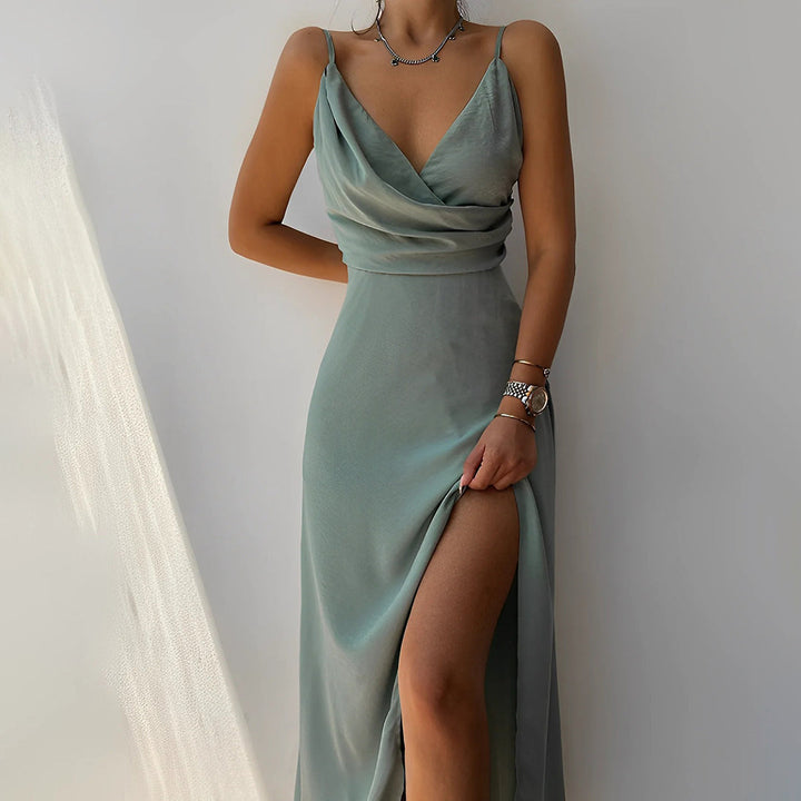 Chic women's evening maxi dress featuring a sophisticated V-neck and a stylish thigh-high split. Timeless fashion.