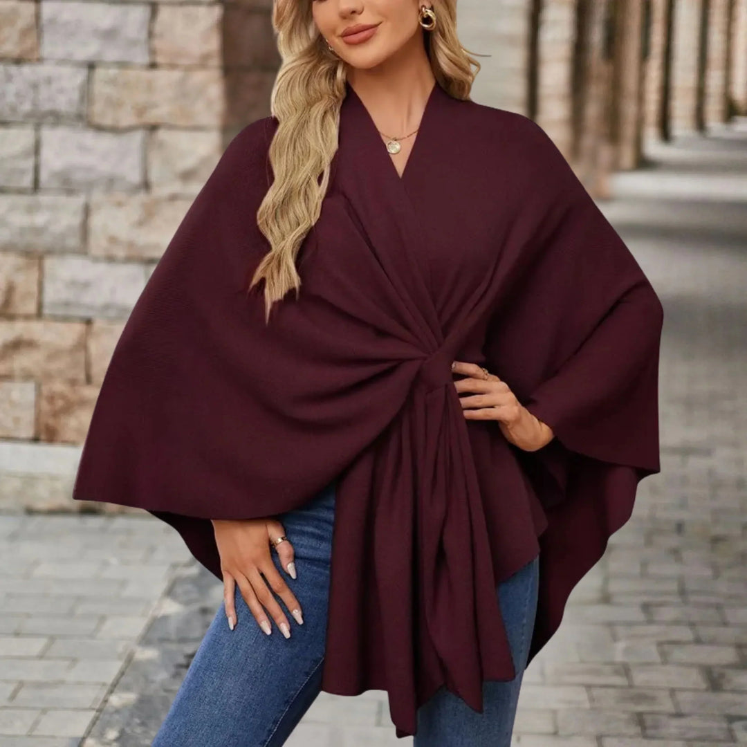 Women's elegant draped poncho, a cozy & versatile fall winter layer. Chic comfort.