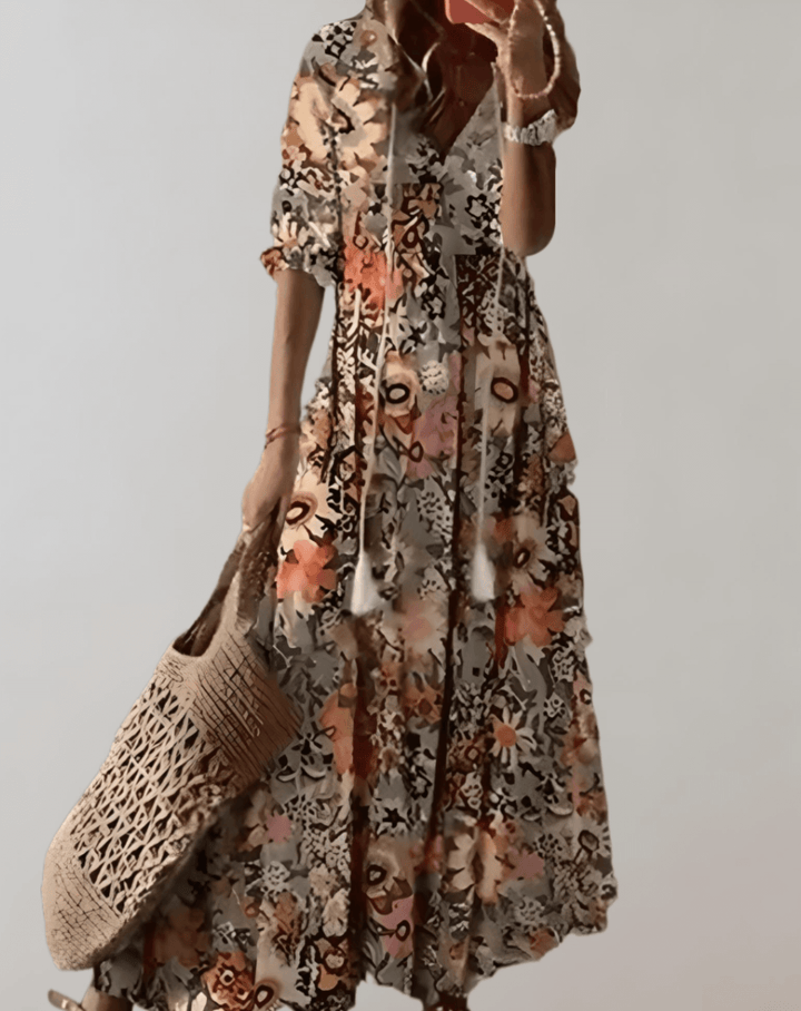 Women's long floral bohemian dress, a flowy and elegant choice for summer and vacations.