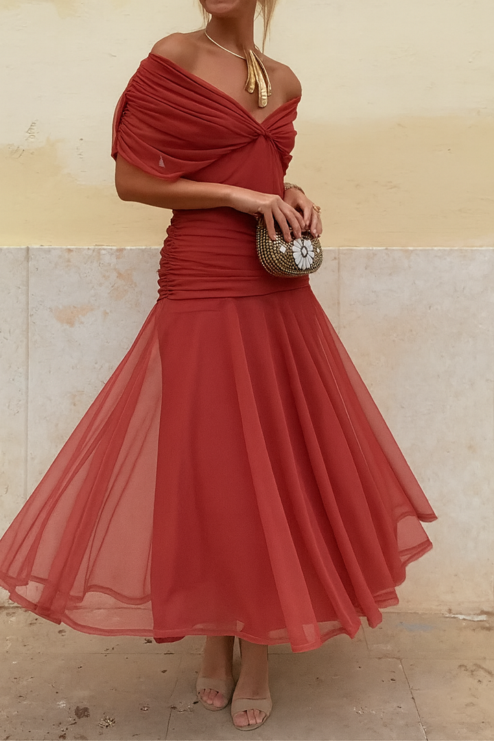 Women's elegant flowing midi dress, perfect for special occasions. Chic party wear with summer style.