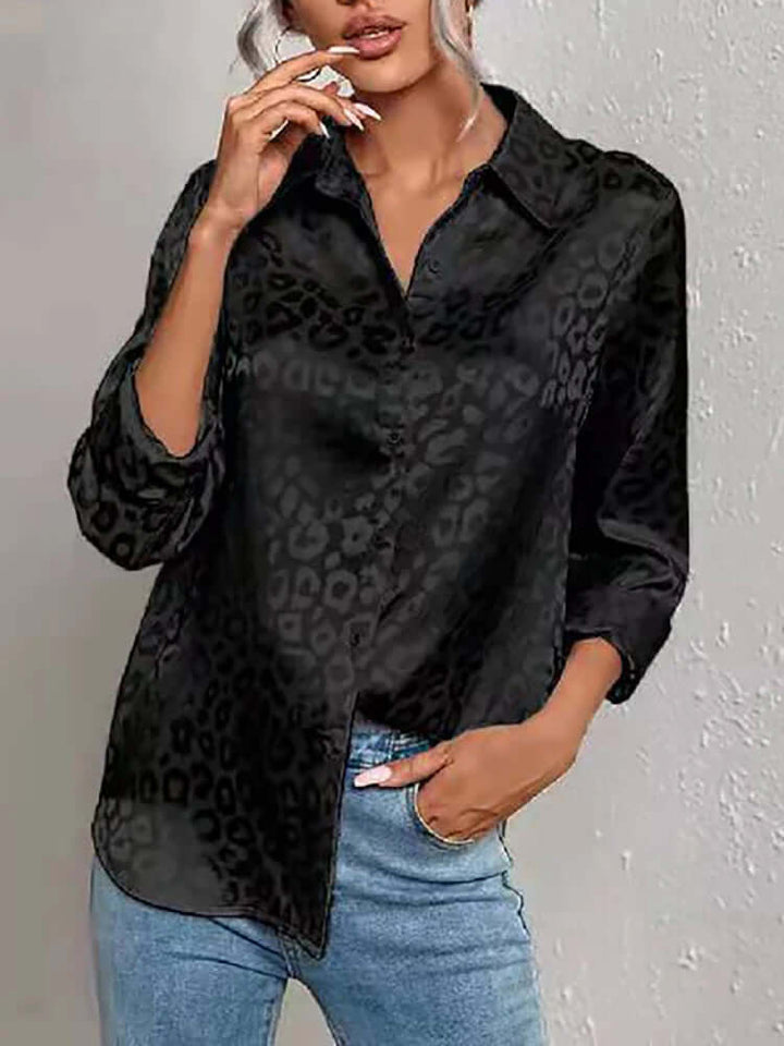 Sophisticated women's animal print jacquard blouse, a chic long sleeve top.