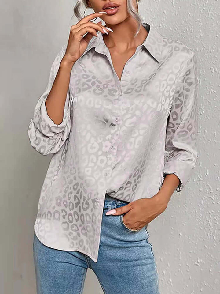 Women's chic long sleeve blouse with elegant leopard jacquard pattern.