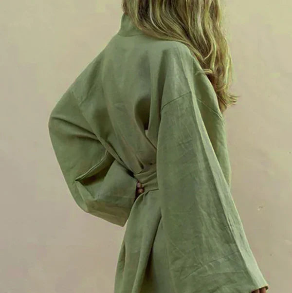 Stylish women's kimono dress. Elegant & comfortable for day wear. Features a flowy design, great for casual chic.