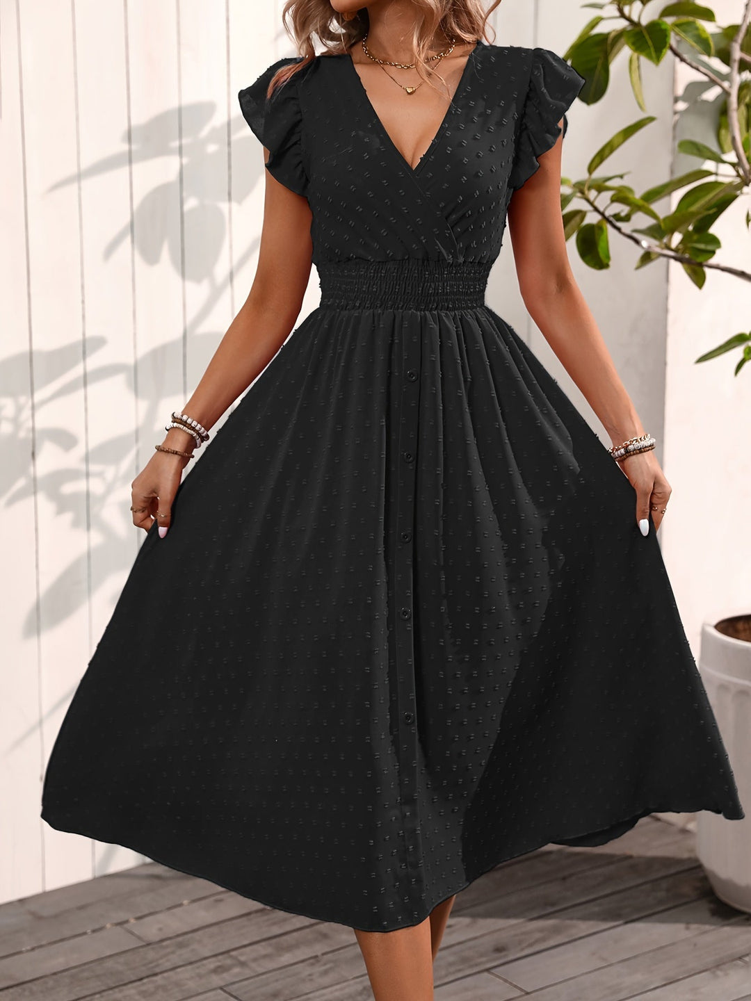 Casual yet elegant women's V-neck midi dress, ruffle sleeves, smocked waist, dotted, for ladies fashion.