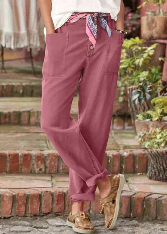 Back view of women's relaxed trousers, highlighting the elegant drape and flattering wide-leg silhouette.