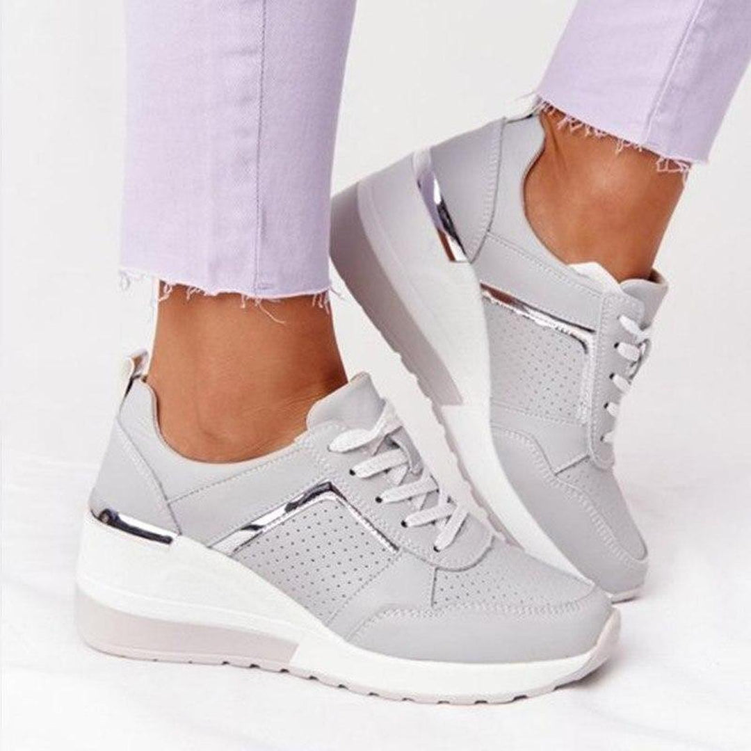 Sleek women's platform wedge sneakers, perfect for everyday casual elegance & foot relief.