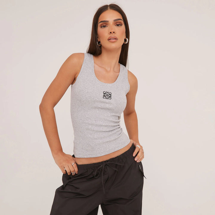 Women's fitted racerback tank top in grey, a versatile sleeveless essential for casual or layering outfits.