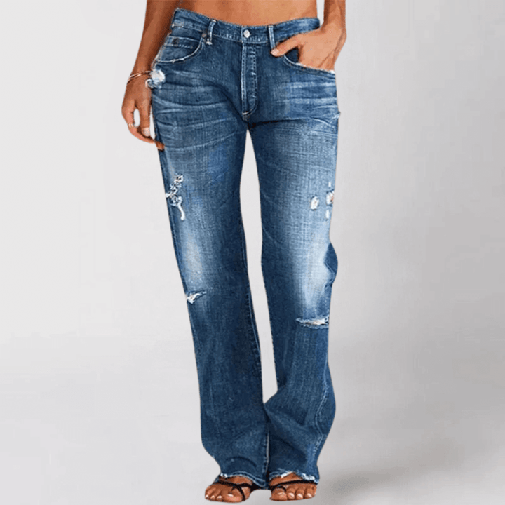 Stylish women's mid-rise stretch bootcut denim jeans, offering casual comfort for everyday wear.