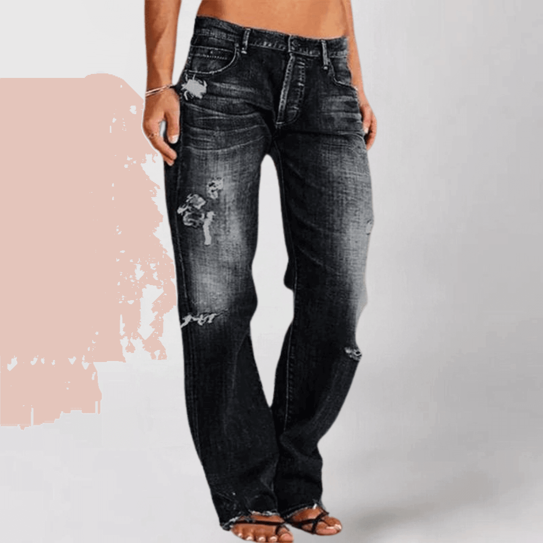 Flattering women's mid-rise stretch bootcut jeans, perfect everyday bottoms for stylish comfort.