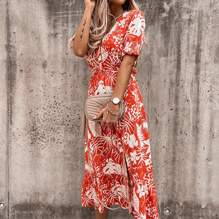 Vibrant floral print maxi dress for women, featuring a practical button-front and trendy side slit, ideal for summer.
