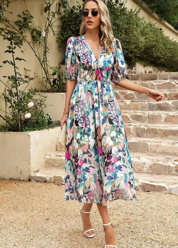 Chic women's floral midi V-neck dress with vibrant print. Elegant casual wear for summer events & race day.