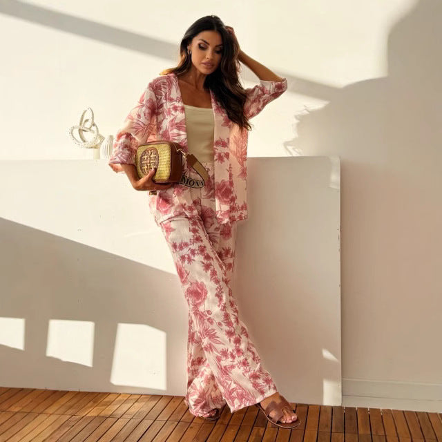 Vibrant floral print long sleeve top and wide-leg pants women's set, ideal for summer vacations & stylish comfort.