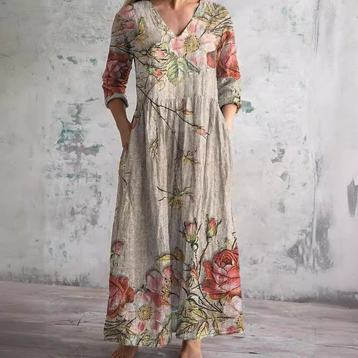 Women's floral V-neck summer midi dress for warm weather. Effortlessly elegant and comfortable casual style.