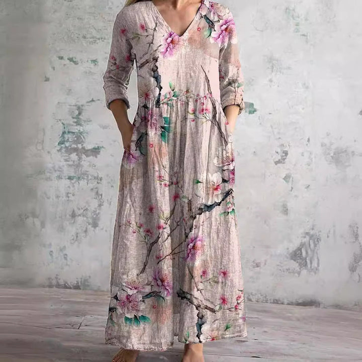 Breezy women's floral summer dress with V-neck, perfect for warm weather. Flattering and feminine day dress.