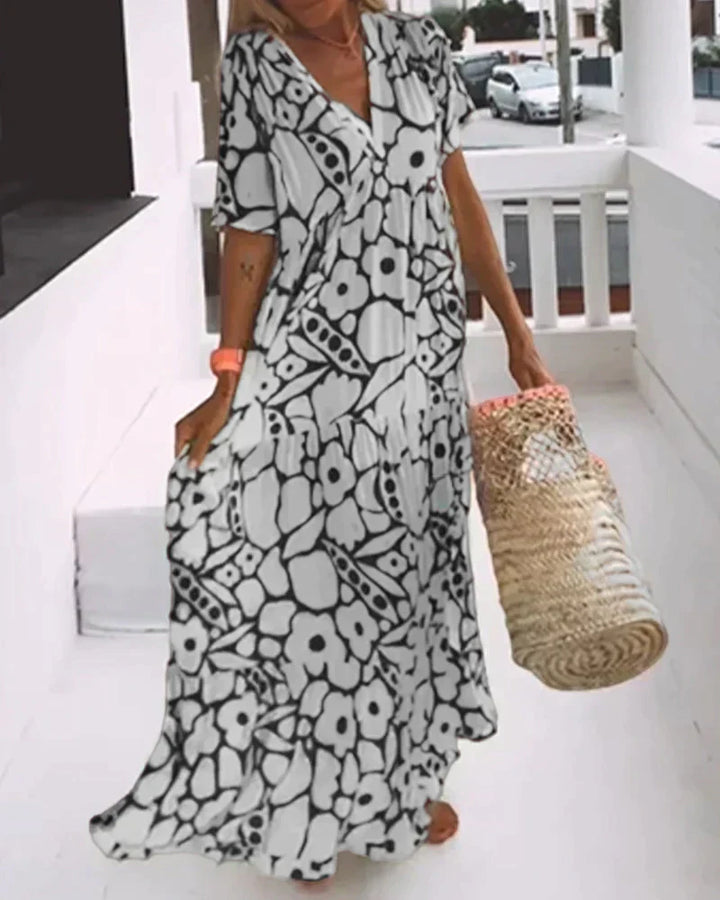 Lightweight & flowing women's summer maxi dress. Comfortable loose fit, perfect for warm weather & everyday wear.