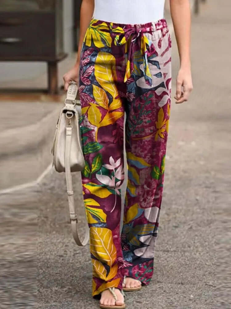 Stylish women's floral wide-leg pants with a comfortable flowy design. Perfect for summer casual wear.