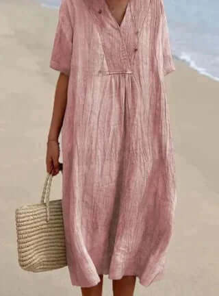 Women's relaxed fit flowy linen midi dress, breathable fabric for summer casual elegance.