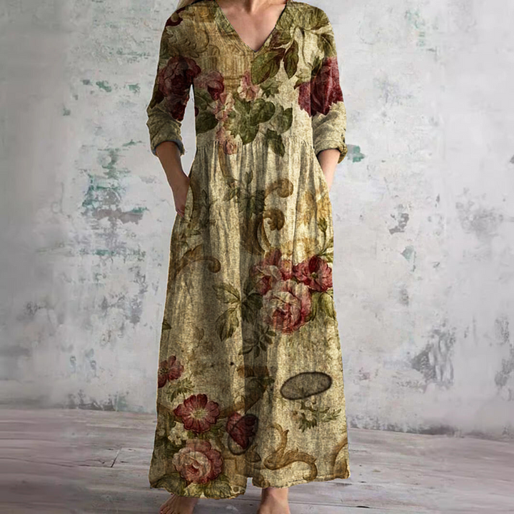 Women's comfortable V-neck floral maxi dress. Flowy summer style for casual events & beach days.